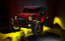 Load image into Gallery viewer, Jeep with Oracle Bluetooth + RF Underbody Rock Light Kit in action, showcasing ColorSHIFT technology and performance car parts.