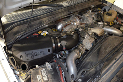 Injen 08-10 Ford F-250/F-350 6.4L Powerstroke Evolution Intake in engine bay for performance upgrades
