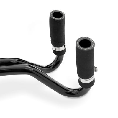 Close-up of black handlebars with grips