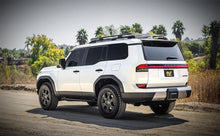 Load image into Gallery viewer, Magnaflow 2024 Lexus GX550 Overland Series Cat-Back Performance Exhaust System with high clearance design for off-road.