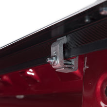 Load image into Gallery viewer, Installation detail of Tonno Pro 17-19 Ford F-250/F-350 Super Duty 6.8ft Bed Lo-Roll Tonneau Cover clamp
