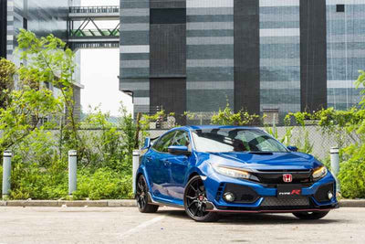 Blue performance car parked outside