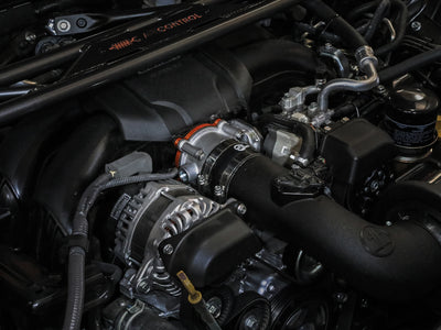 aFe Silver Bullet Throttle Body Spacers TBS 22-23 Toyota GR86 H4-2.4L - Orange in engine, performance car parts