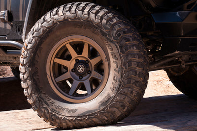 ICON Rebound Pro 17x8.5 6x5.5 0mm Offset 4.75in BS 106.1mm Bore Bronze Wheel on off-road vehicle