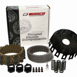Wiseco 02-19 Yamaha YZ85 Clutch Cover showcased with components, ideal for tuning upgrades and performance car parts.