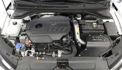AEM C.A.S 19-20 Hyundai Veloster N Cold Air Intake System installed in car engine for performance upgrades by DTX Performance.