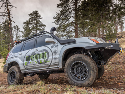 ICON 03-09 Lexus GX470 0-3.5in Stage 5 Suspension System w/Tubular UCA on off-road vehicle in forest, DTX Performance, upgrades