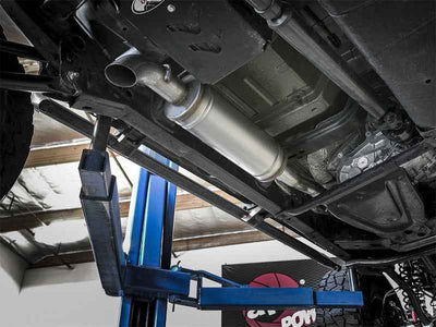 aFe Rock Basher 3in 409 SS Cat-Back Turn-Down Exhaust 12-18 Jeep Wrangler (JK) V6 3.6L/ 07-11 3.8L installed on a vehicle lift