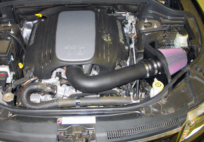 K&N 11-14 Jeep Grand Cherokee 5.7L V8 Performance Intake Kit in engine, high performance auto parts