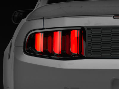 Raxiom 10-12 Ford Mustang Vector V2 LED Tail Lights - Gloss Black Housing (Clear Lens) on a high-performance Mustang