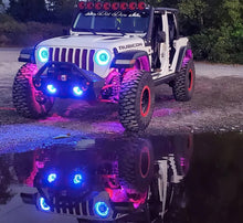 Load image into Gallery viewer, Oracle Bluetooth + RF Underbody Rock Light Kit - 8 PCS - ColorSHIFT on a Jeep with colorful LED lights