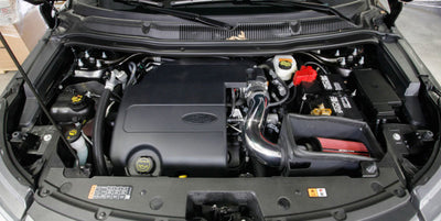 Spectre 11-19 Ford Explorer V6-3.5L F/I Air Intake Kit - Polished Aluminum w/Red Filter in engine bay.