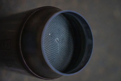 Close-up of a Kooks exhaust component for Dodge Challenger SRT Hellcat, high performance car part for enhanced engine output