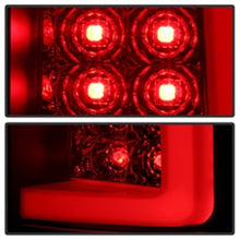 Load image into Gallery viewer, Spyder 07-13 Silverado V3 Tail Lights displaying bright red LED bulbs with a black smoke design for Chevy Silverado 2007-2013.