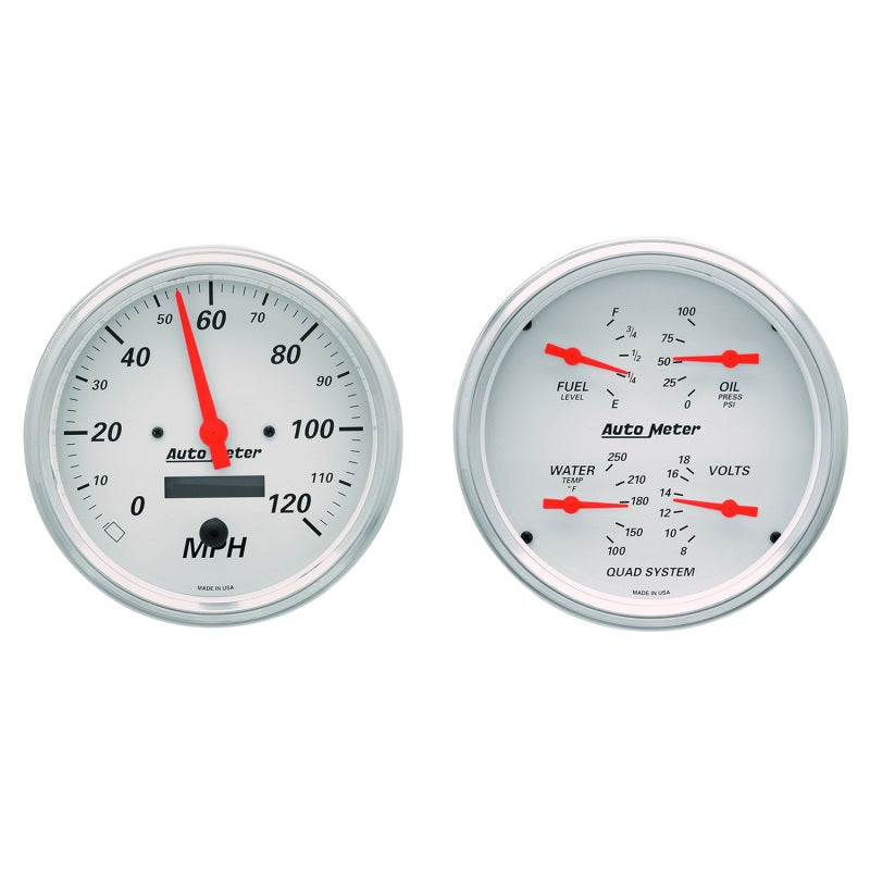 AutoMeter Gauge Kit 2 Pc. Quad & Speedometer 5in. Arctic White shown for performance car applications.