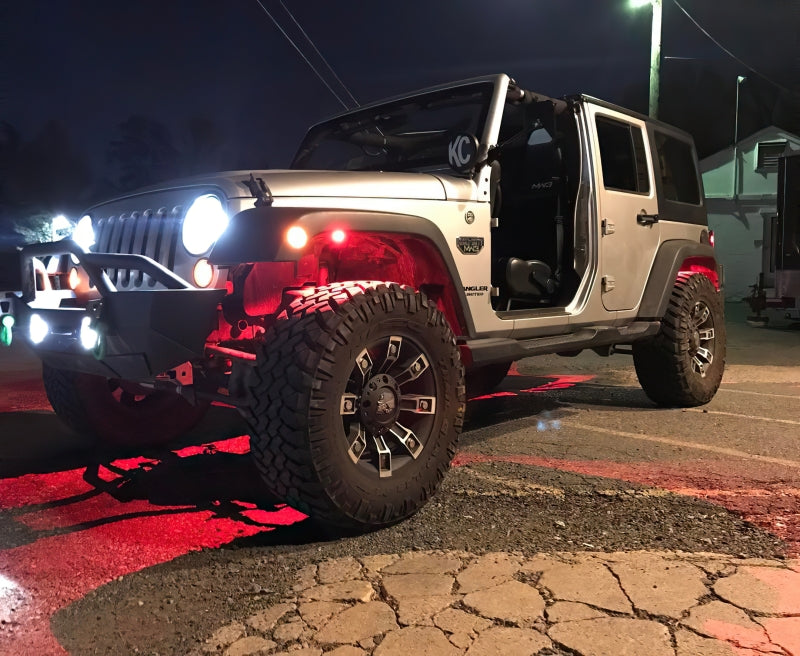 Oracle Bluetooth + RF Underbody Rock Light Kit - 8 PCS - ColorSHIFT installed on 4x4 Jeep, perfect for performance car parts lovers.