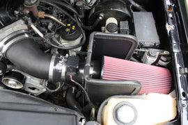 JLT 99-04 Ford Lightning Black Textured Big Air Intake Kit w/Red Filter in engine bay, available at DTX Performance