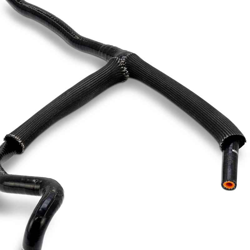 Mishimoto 11-14 Ford 6.7L Powerstroke Coolant Overflow Hose for performance upgrades at DTX Performance, veteran-owned performance shop.