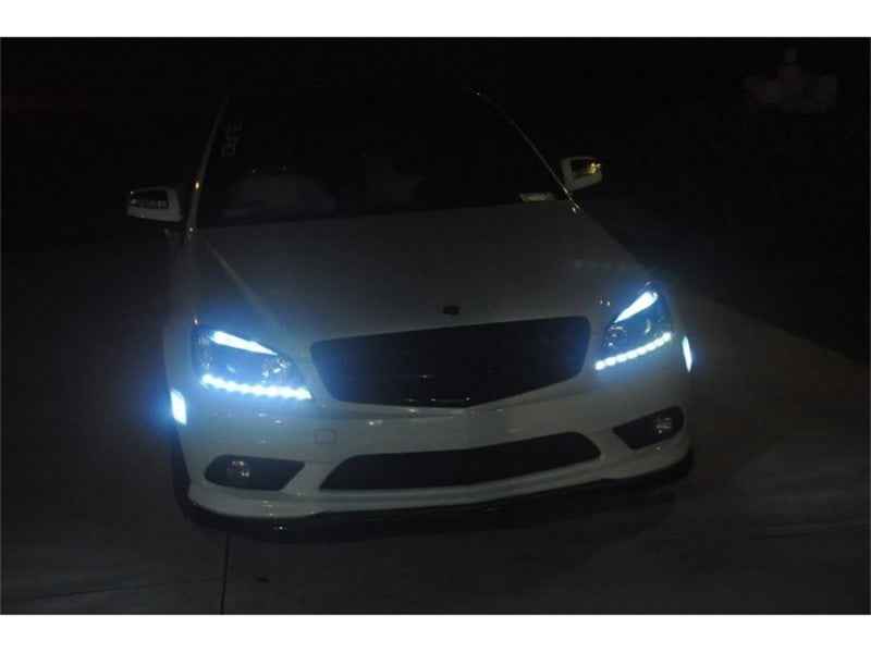Spyder Mercedes Benz C-Class 08-11 Projector Headlights Halogen - DRL Blk PRO-YD-MBW20408-DRL-BK on white car at night