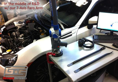 GrimmSpeed R&D with 7-Axis Faro Arm in workshop