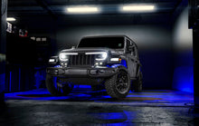 Load image into Gallery viewer, Oracle Bluetooth + RF Underbody Rock Light Kit - 8 PCS - ColorSHIFT on off-road vehicle in garage scene