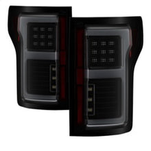 Load image into Gallery viewer, Spyder 15-17 Ford F-150 LED Tail Lights - High performance lights with blind spot feature, black smoke design. DTX Performance parts.