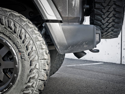 aFe MACH Force-Xp Axle-Back Exhaust System w/Black Tip 18-20 Jeep Wrangler L4-2.0T / V6-3.6L on Jeep tire detail