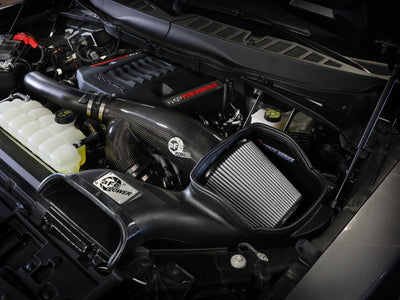 aFe 21-24 Ford F150 Raptor Track Series Carbon Fiber Cold Air Intake System w/ Pro DRY S Filter in engine bay