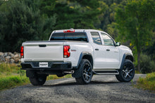 Load image into Gallery viewer, 2023 Chevy Colorado with MBRP 3in Cat-Back exhaust on a rural path