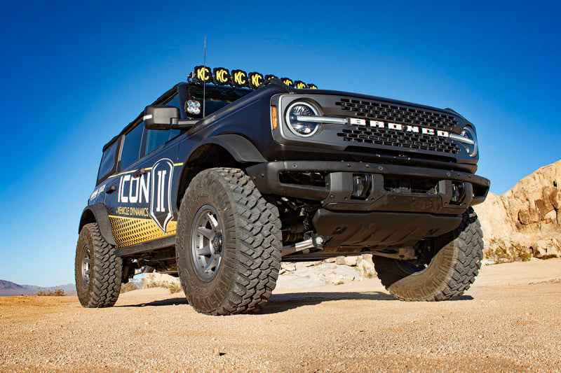 ICON 21-UP Ford Bronco 2-3in Front 2.5 VS RR COILOVER KIT on off-road terrain, showcasing performance suspension upgrade.