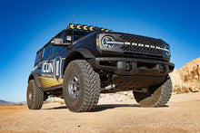 Load image into Gallery viewer, ICON 21-UP Ford Bronco 2-3in Front 2.5 VS RR COILOVER KIT on off-road terrain, showcasing performance suspension upgrade.