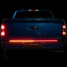 Load image into Gallery viewer, Putco 48in LED Tailgate Light Bar Blade on truck for enhanced visibility, available at veteran owned DTX Performance shop.
