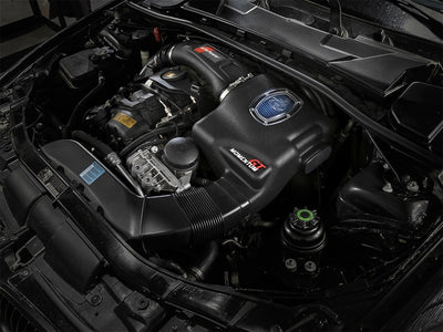 aFe Momentum GT Pro 5R Cold Air Intake System installed in BMW 335i engine for enhanced performance by DTX Performance