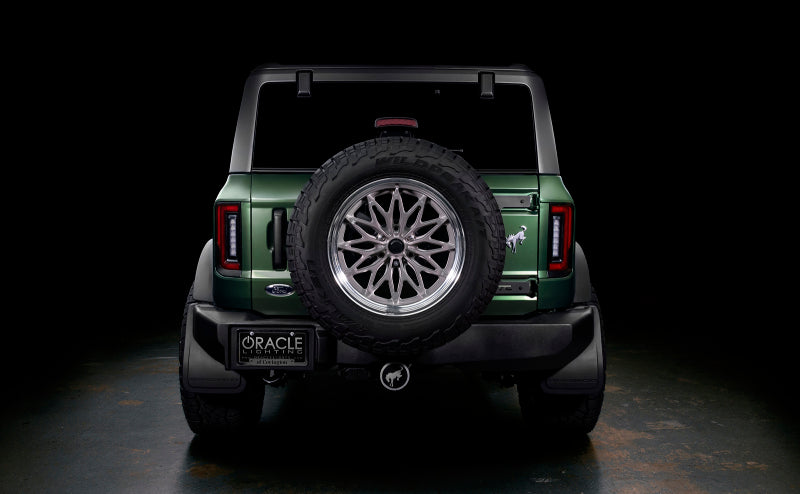 Oracle Lighting 21-22 Ford Bronco Flush Style LED Taillights on green car, DTX Performance high-performance car parts.