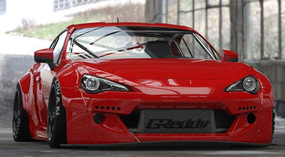 Red car with GReddy X Rocket Bunny Optional DRL LED Light Kit