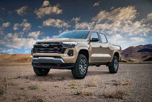Load image into Gallery viewer, ICON 2023+ Chevrolet Colorado UCA DJ Pro Kit on desert terrain