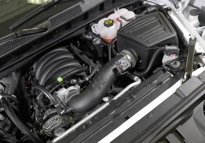 K&N 2019 Chevrolet / GMC 1500 V8-5.3/6.2L F/I AirCharger Performance Intake in car engine bay