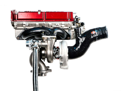 Forced Performance Mitsubishi Evo 9 Cast O2 Housing Assembly (w/o Dump Tube) for high performance tuning upgrades.