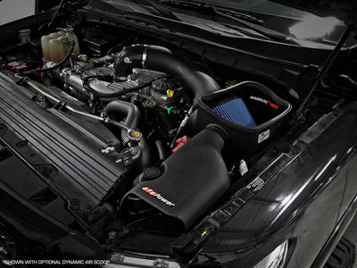 aFe Magnum Force Stage-2 Pro 5R Cold Air Intake System 16-19 Nissan Titan XD V8-5.0L (td) installed in engine bay, boosting performance
