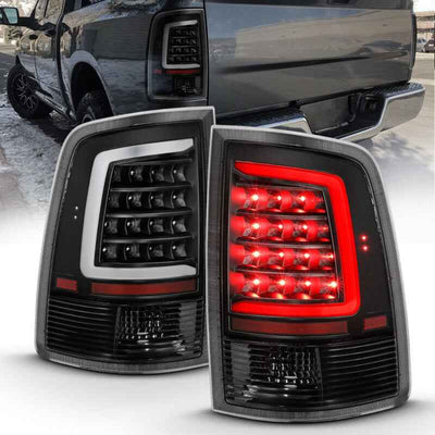 ANZO 2009-2018 Dodge Ram 1500 LED Taillight Plank Style Black w/Clear Lens displayed on a truck, perfect for performance upgrades.