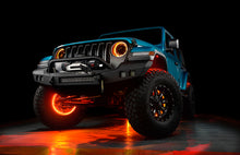 Load image into Gallery viewer, Oracle Bluetooth + RF Underbody Rock Light Kit - 8 PCS - ColorSHIFT installed on off-road vehicle, enhancing performance car parts.