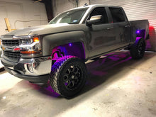 Load image into Gallery viewer, Truck with Oracle Bluetooth + RF Underbody Rock Light Kit - 8 PCS - ColorSHIFT from DTX Performance, showcasing LED lights.