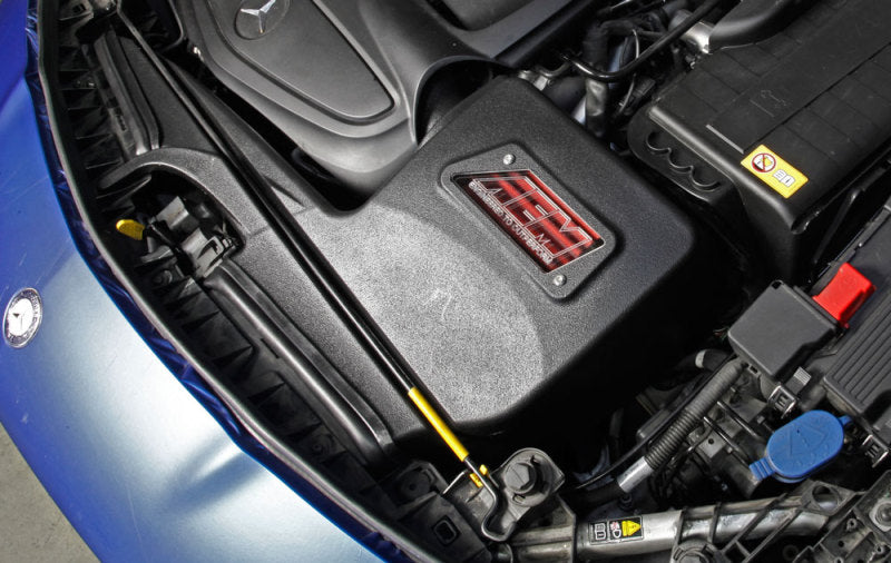 AEM 13-15 Mercedes CLA250 L4 2.5L Silver Cold Air Intake in engine bay, performance car parts by DTX Performance