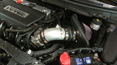 K&N 12 Honda Civic Si 2.4L L4 Silver Typhoon Intake installed in engine bay; ideal for performance car parts and tuning upgrades.
