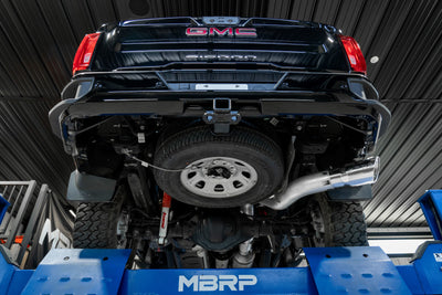 MBRP 20-23 Chevrolet Silverado 2500HD 6.6L Armor Plus T409 SS exhaust on lift at veteran owned performance shop
