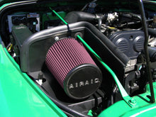 Load image into Gallery viewer, Airaid 03-06 Jeep Wrangler 2.4L CAD Intake System w/ Tube (Dry / Red Media) - DTX Performance