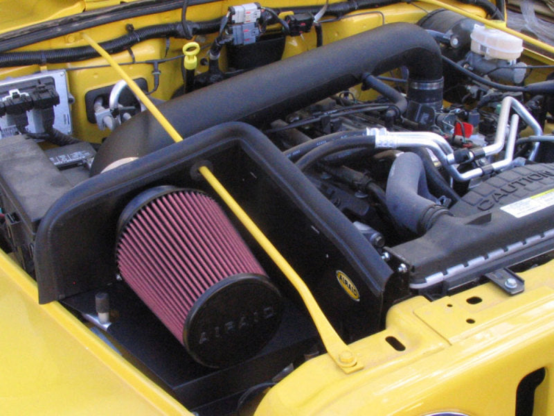 Airaid 97-06 Jeep Wrangler TJ 4.0L CAD Intake System w/ Tube (Oiled / Red Media) - DTX Performance