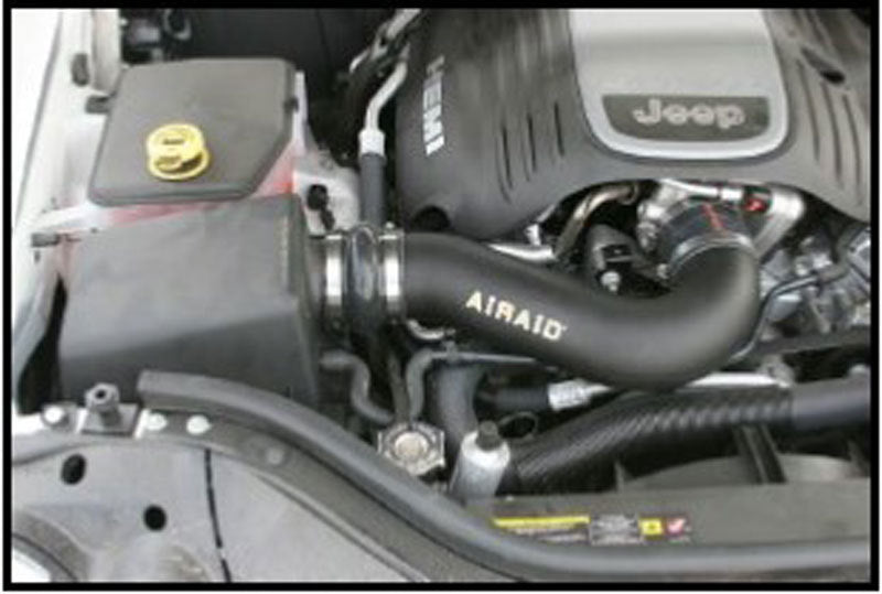 Airaid 05-10 Jeep Grand Cherokee 5.7L Hemi Airaid Jr Intake Kit - Dry / Red Media - DTX Performance